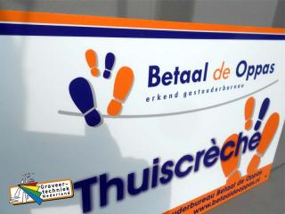 reclamebord langs het veld sportvereniging